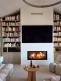 Cheminees-decoratives FOYER BOIS - SPARTHERM - VARIA B 120H Salon-chaleureux-avec-cheminee-et-bibliotheque.png