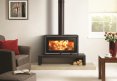 poele-a-bois STUDIO AIR 1 FREESTANDING Studio-Air-1-Freestanding-with-White-decorative-trim-on-120-low-stove-bench_2.jpg
